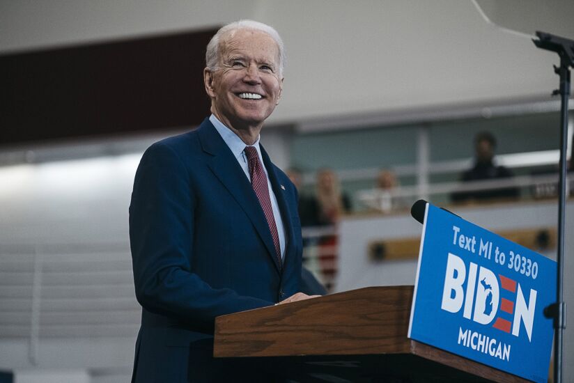 Former Vice President Joe Biden, 2020 Democratic presidential candidate, smiles during a campaign event in Detroit, Michigan, U.S., on Monday, March 9, 2020. Biden said that he would be a bridge to a new generation, restoring the countrys values following Donald Trumps presidency and then leaving the country to younger leaders. Photographer: Erin Kirkland/Bloomberg