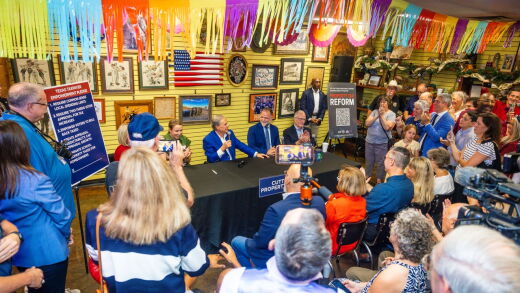 Texas Gov. Greg Abbott (with microphone) at a June 29 campaign event.
