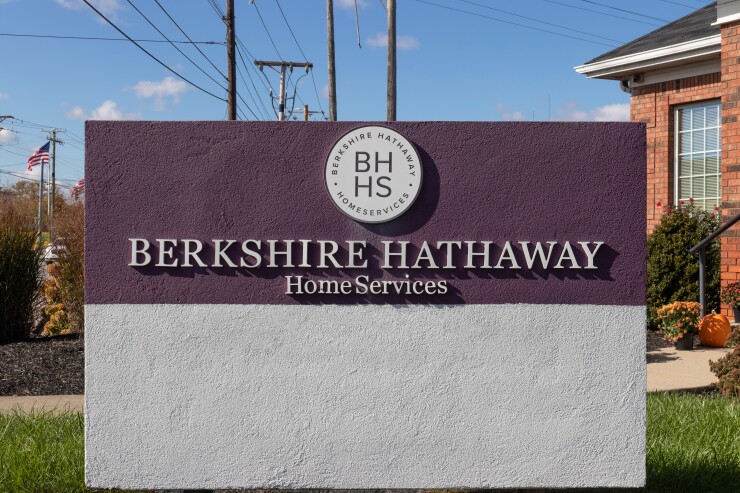 Muncie - Circa November 2021: Berkshire Hathaway HomeServices sign. HomeServices is subsidiary of Berkshire Hathaway Energy.