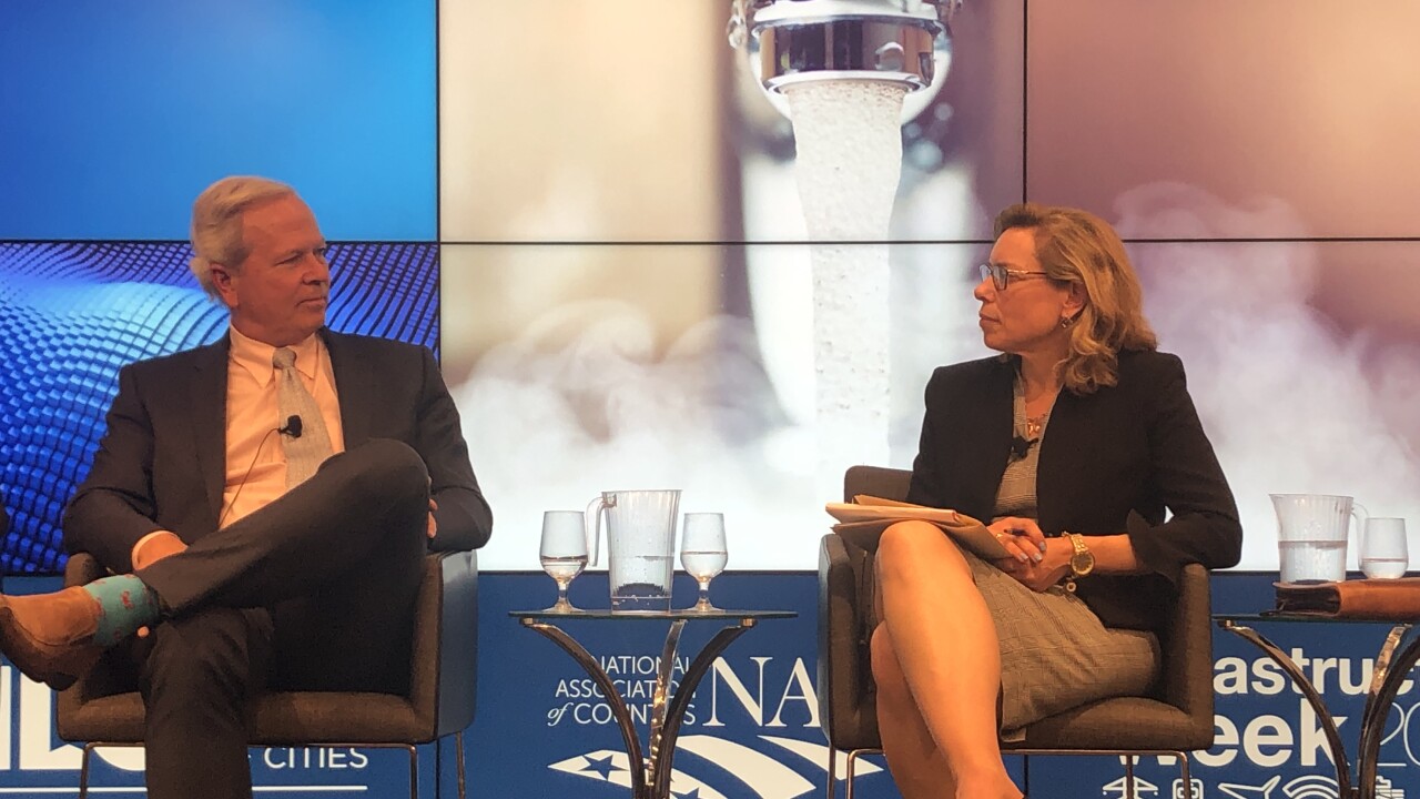 Left to right, Ted Henifin, general manager of the Hampton Roads Sanitation District and Kyle Dreyfuss-Wells, chief executive officer at the Northeast Ohio Regional Sewer District discuss smart water during Infrastructure Week.