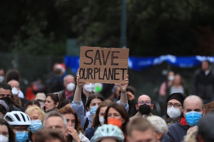 Environmental protesters during a "Fridays for Future" demonstration in Berlin, Germany, on Friday, Sept. 24, 2021. Greta Thunberg is attending a demonstration in Berlin as part of a global climate strike organized by the “Fridays for Future” movement that the Swedish teen activist helped inspire. Photographer: Krisztian Bocsi/Bloomberg