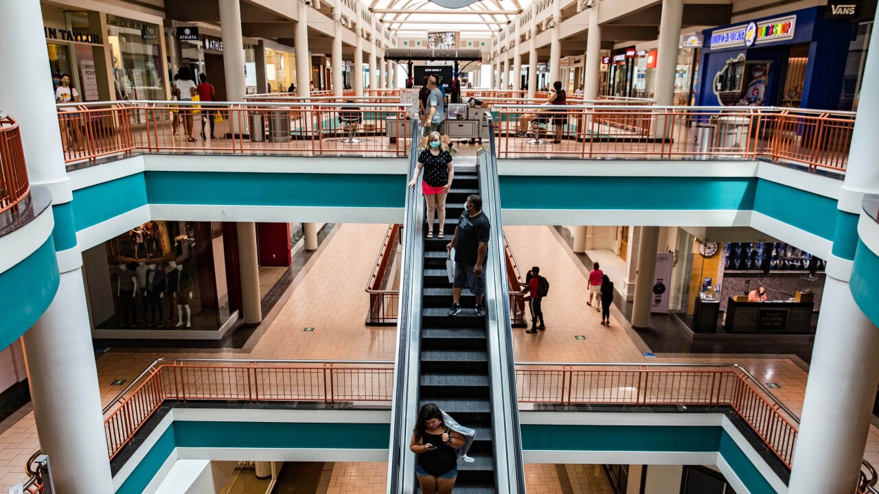 Shoppers walk through the Destiny USA mall in Syracuse, New York, on July 10, 2020.