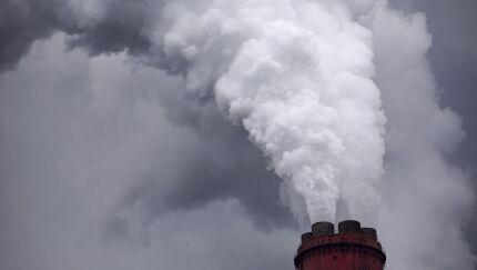 Vapour Rises From A Chimney Stack