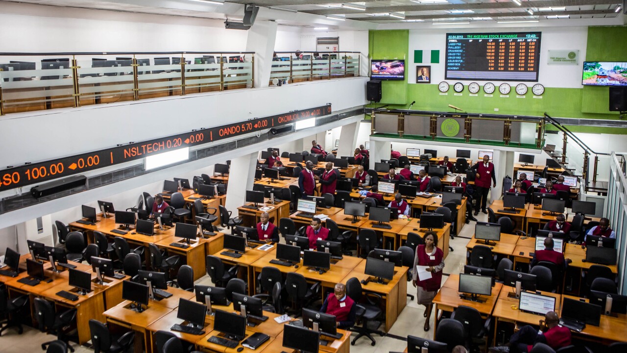 Employees work on the trading floor at the Nigerian Stock Exchange (NSE) in Lagos.