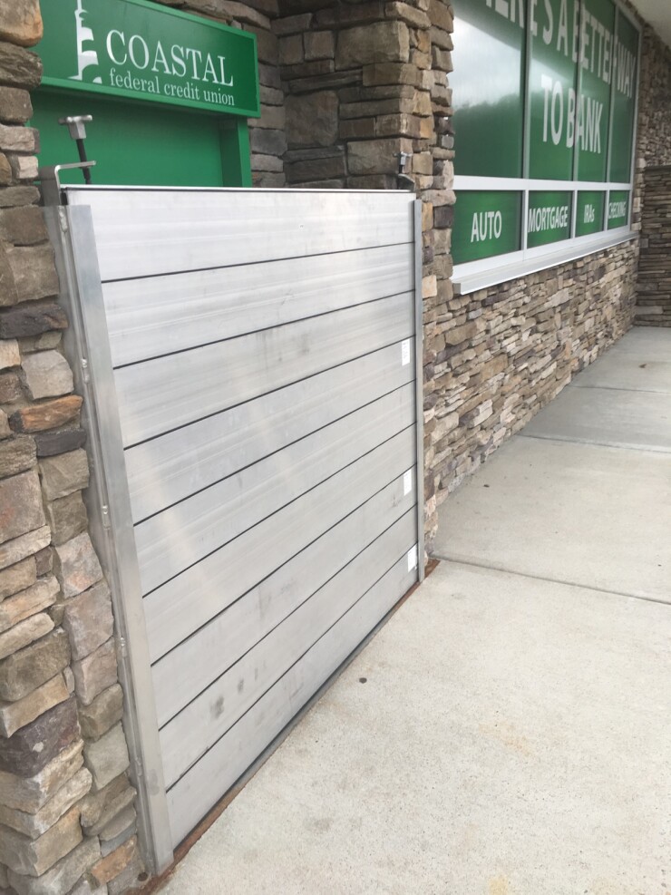 Coastal Credit Union in Raleigh, N.C. erected flood barriers at its Crabtree Mall branch in advance of Hurricane Florence