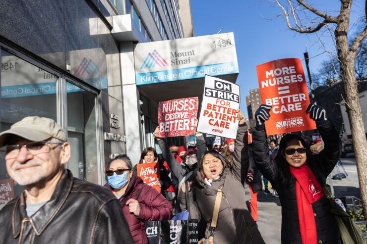 Nurses on a three-day strike at Mount Sinai in January. They returned to work after agreeing to a contract that will guarantee both higher staffing levels and wages