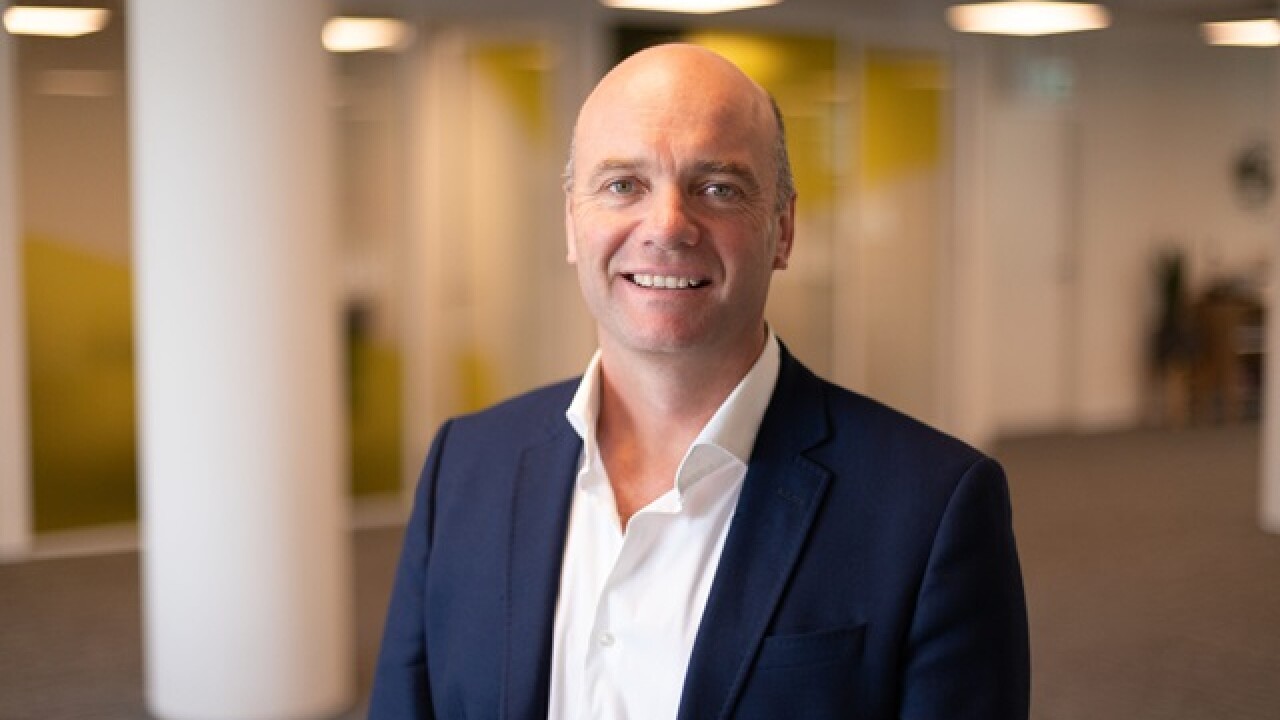 Head shot of Angus McDonald, CEO and co-founder of Cover Genius.