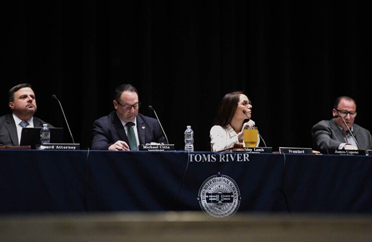 Members of the Toms River school board at a meeting