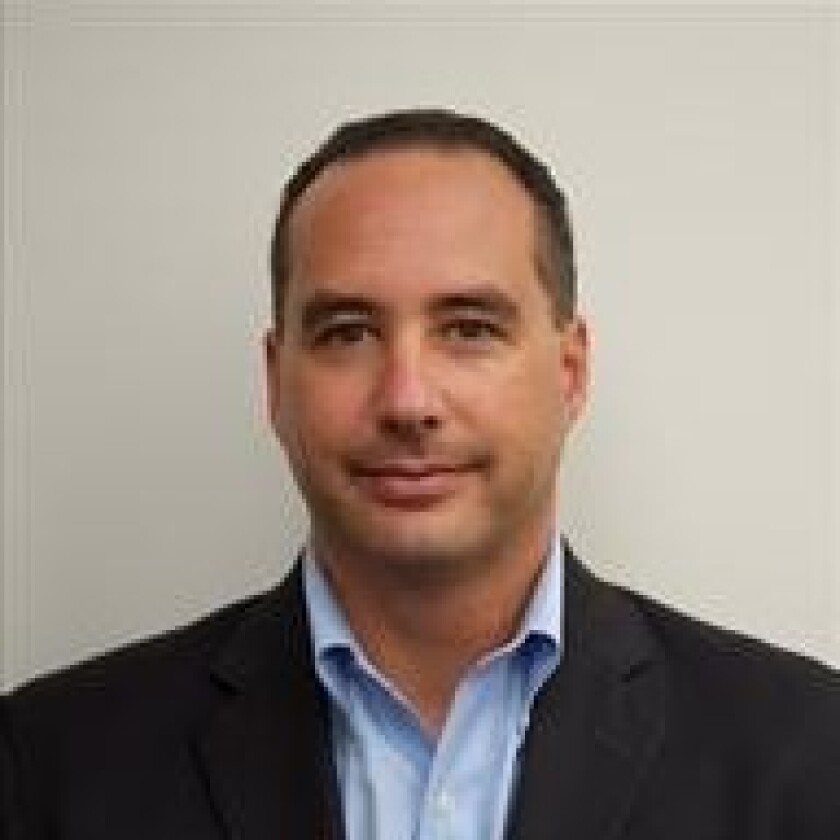 Headshot of George Tziahanas.