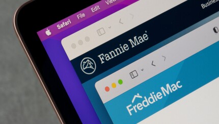 Portland, OR, USA - Apr 12, 2022: Homepages of Fannie Mae (the Federal National Mortgage Association) and Freddie Mac (the Federal Home Loan Mortgage Corporation) are seen on a MacBook computer.