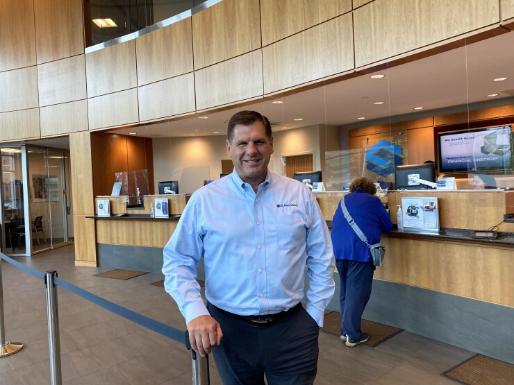 Ken Senus, CEO of St. Mary's Bank, in the branch at headquarters.