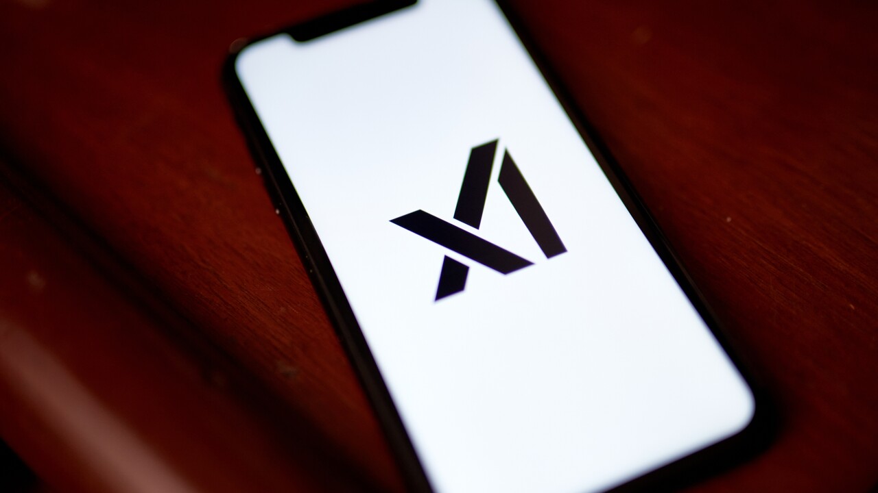 The xAI logo on a mobile phone