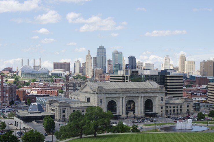 A view of Kansas City Union Station, in the foreground, and the city skyline.