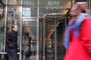 Pedestrians walk by the headquarters of Bear Stearns Friday January 6, 2006 in New York.