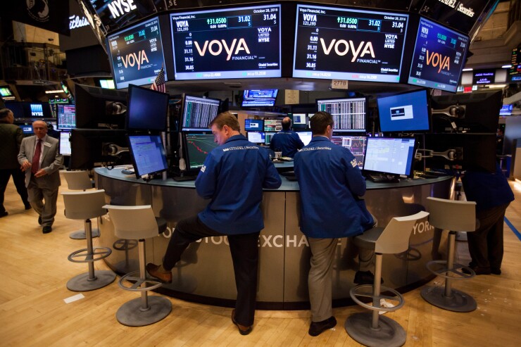 Voya Financial Advisors President Tom Halloran says the firm is inclined to seek an acquisition in order to add a digital platform to its offerings.