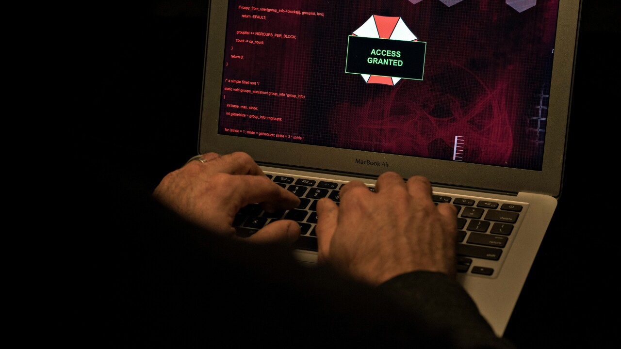 Simulation of someone using a computer to hack.