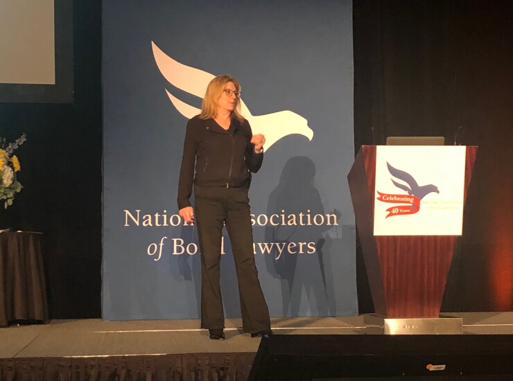 Stevie Conlon speaks at a NABL conference.