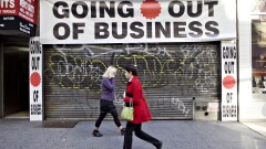 A storefront with a 'Going out of business' sign