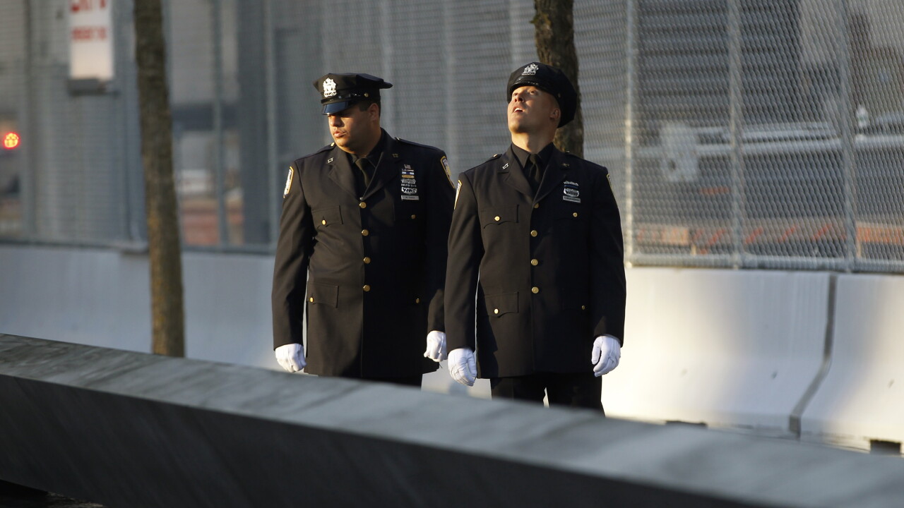 A picture of a two police officers at the Sept. 11 memorial.