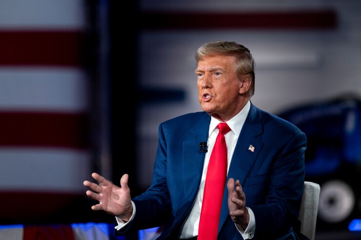 Donald Trump sitting