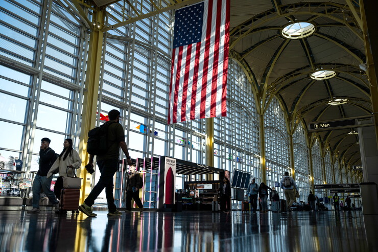Travelers at Ronald Reagan Washington National Airport in Arlington, Virginia.
