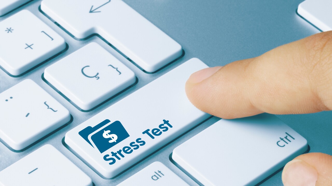 Stress Test Dollar Written on Blue Key of Metallic Keyboard. Finger pressing key.