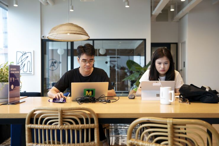 People work at Sentry, a co-working space, in Ho Chi Minh City, Vietnam, on Thursday, Aug. 11, 2022. Industry insiders say Ho Chi Minh City has the makings of the next Silicon Valley-lite: a heavy math and science educational system, a decades-old software outsourcing industry that’s created an abundance of inexpensive and talented engineers and the benefits of Vietnam’s economic expansion, which last year was one of the fastest across Asia. Photographer: Maika Elan/Bloomberg