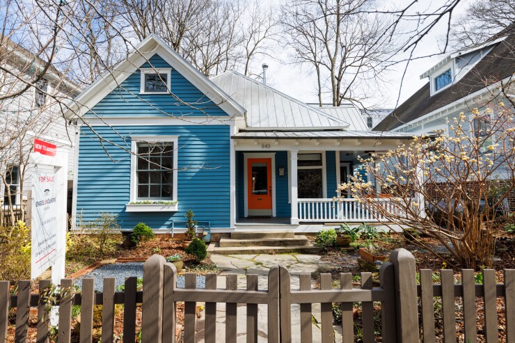 Atlanta house with for sale sign in 2023