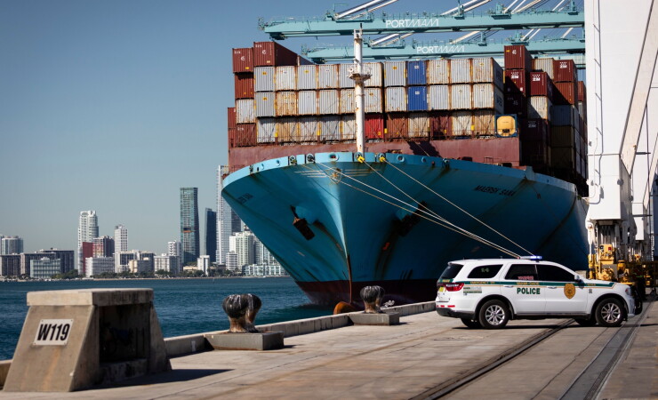 A cargo ship lies moored at PortMiami last month.