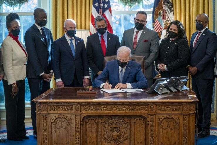 President Biden signs executive order December 2021