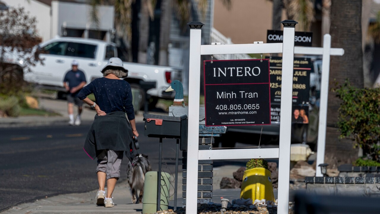 Real estate signage outside residential homes in Discovery Bay, California, US