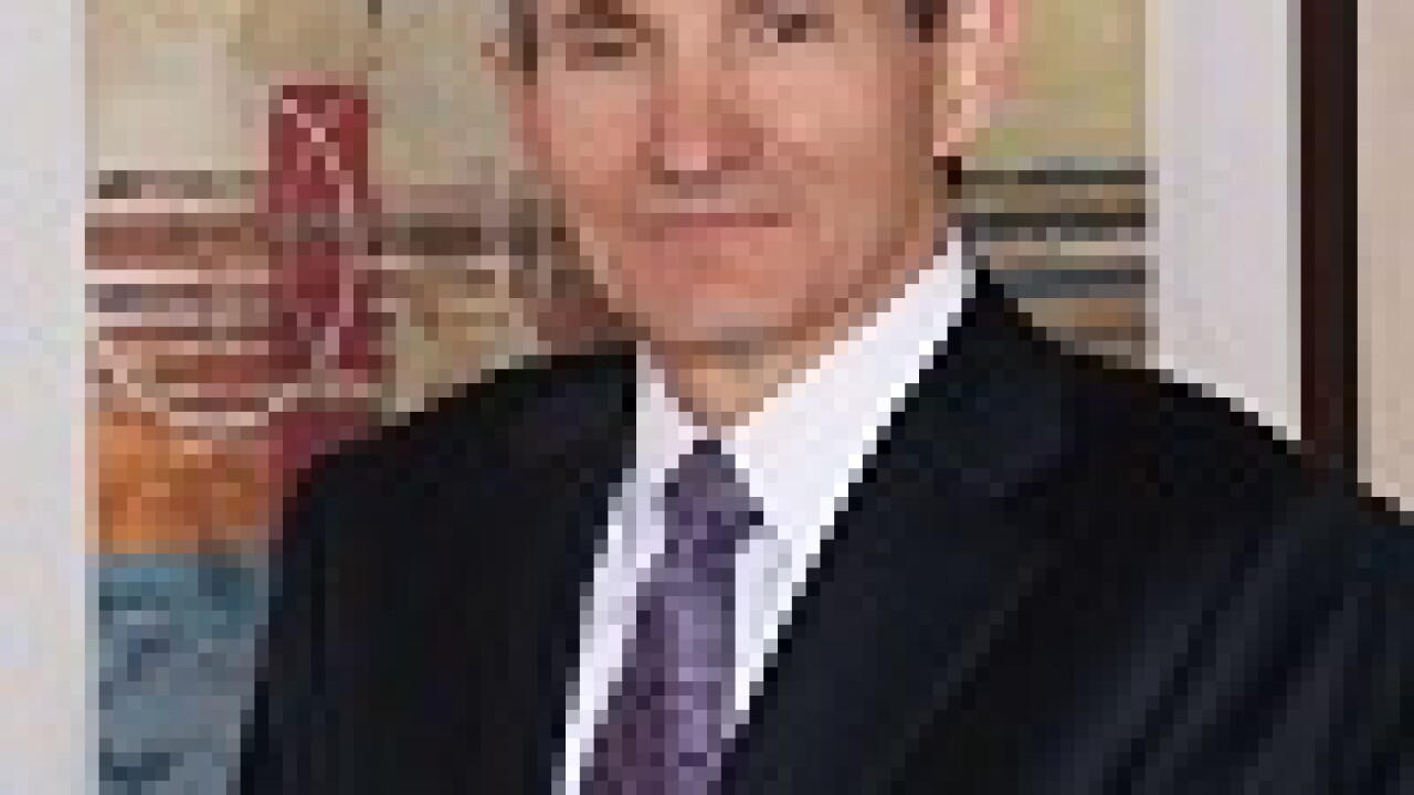 alcottlou-basso-headshot.jpg