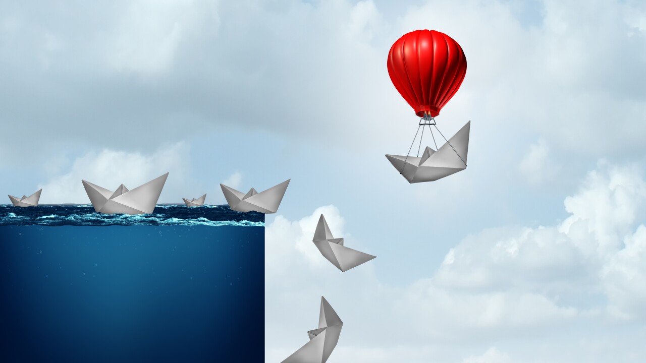 Risk and insurance concept -- paper boats going off a waterfall