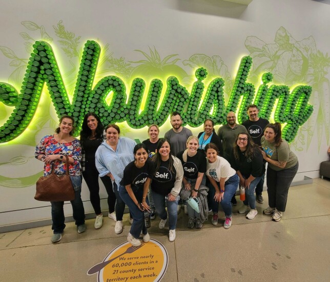 Self Financial team volunteering at Central Texas Food Bank.