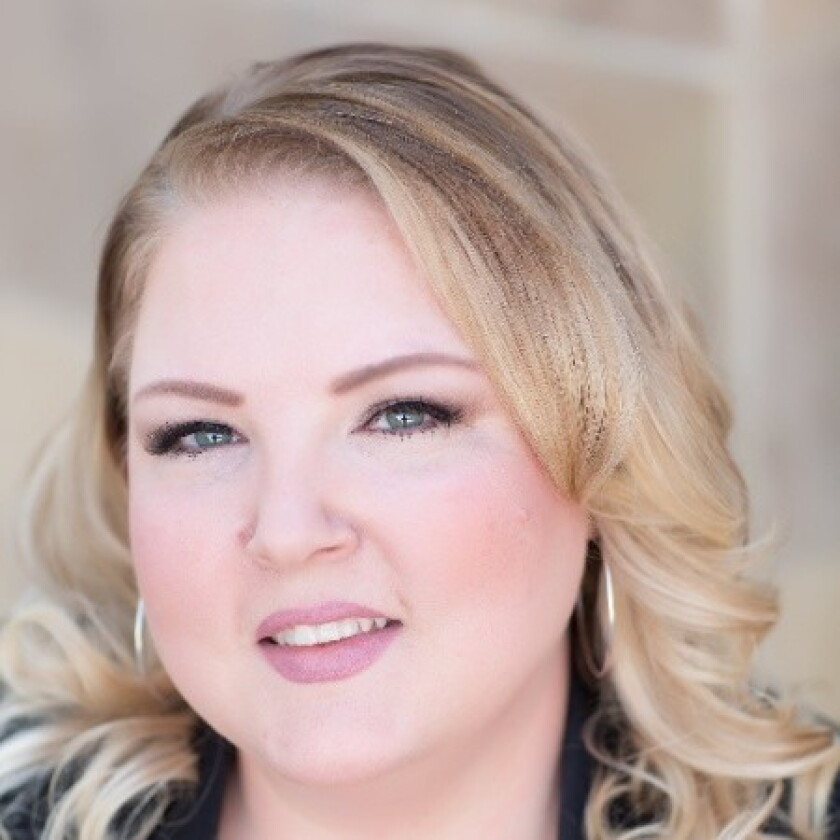 Crystal Solomon, a client business executive for CO-OP Financial Services