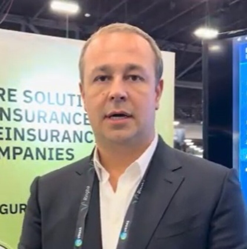 Headshot of Mikhail Grishin.