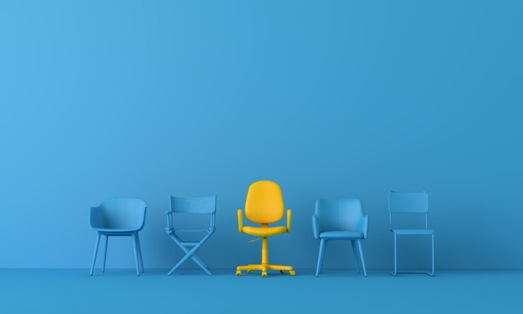 Yellow chair standing out from the crowd. Business concept. 3D rendering