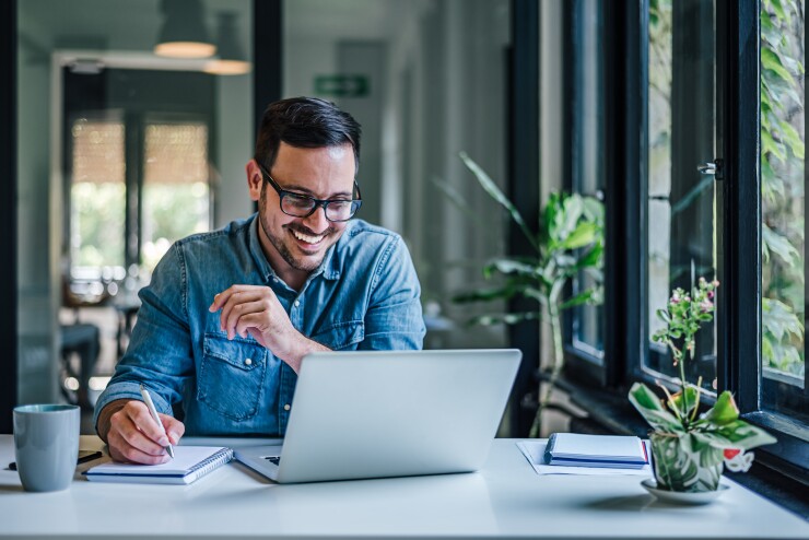 Man working on laptop computer