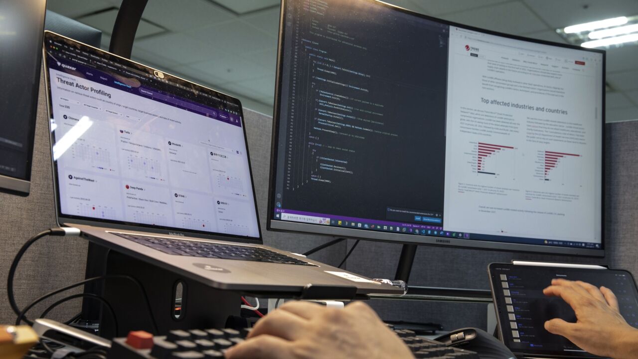 An employee at his desk at S2W Inc., a South Korean cybersecurity company, in Pangyo Techno Valley, Seoul, South Korea, on Wednesday, Aug. 17, 2022. The majority of S2W workers have expertise in North Korea, and they work with international law enforcement to thwart North Korean hacking attempts. The company also has private-sector clients in e-commerce, automotive, semiconductors, and biotech. Photographer: Woohae Cho/Bloomberg