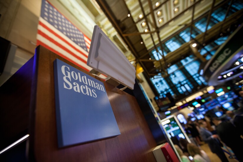 Goldman Sachs signage displayed on the floor of the New York Stock Exchange May 30, 2017 Bloomberg News