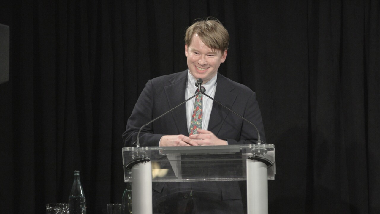 Chicago Debt Manager Brendan White accepts The Bond Buyer's Deal of the Year Award