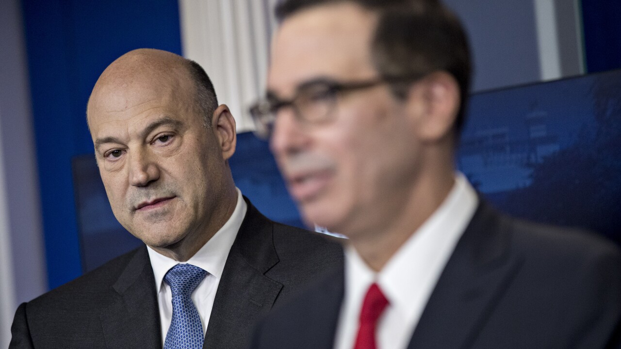 munchin-cohn-0312689009bloomberg