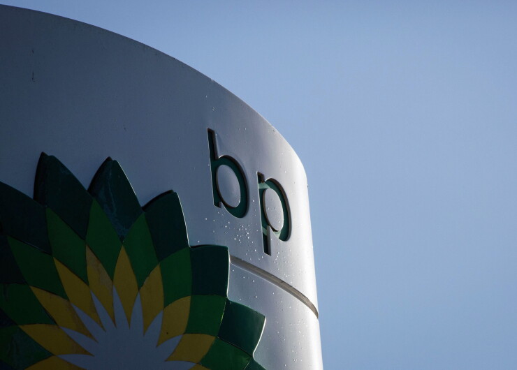 A BP Plc logo sits on a totem sign outside a gas station operated by BP Plc in London, U.K., on Tuesday, Feb 2., 2016.