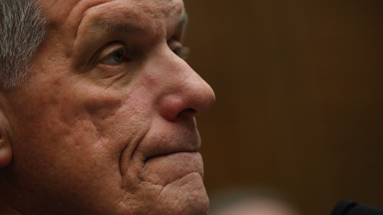 Tim Sloan, president and chief executive of Wells Fargo, waits for the start of a House Financial Services Committee hearing in Washington on March 12, 2019.