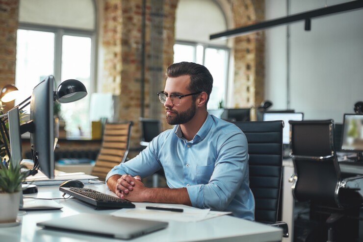 Man working at computer in office
