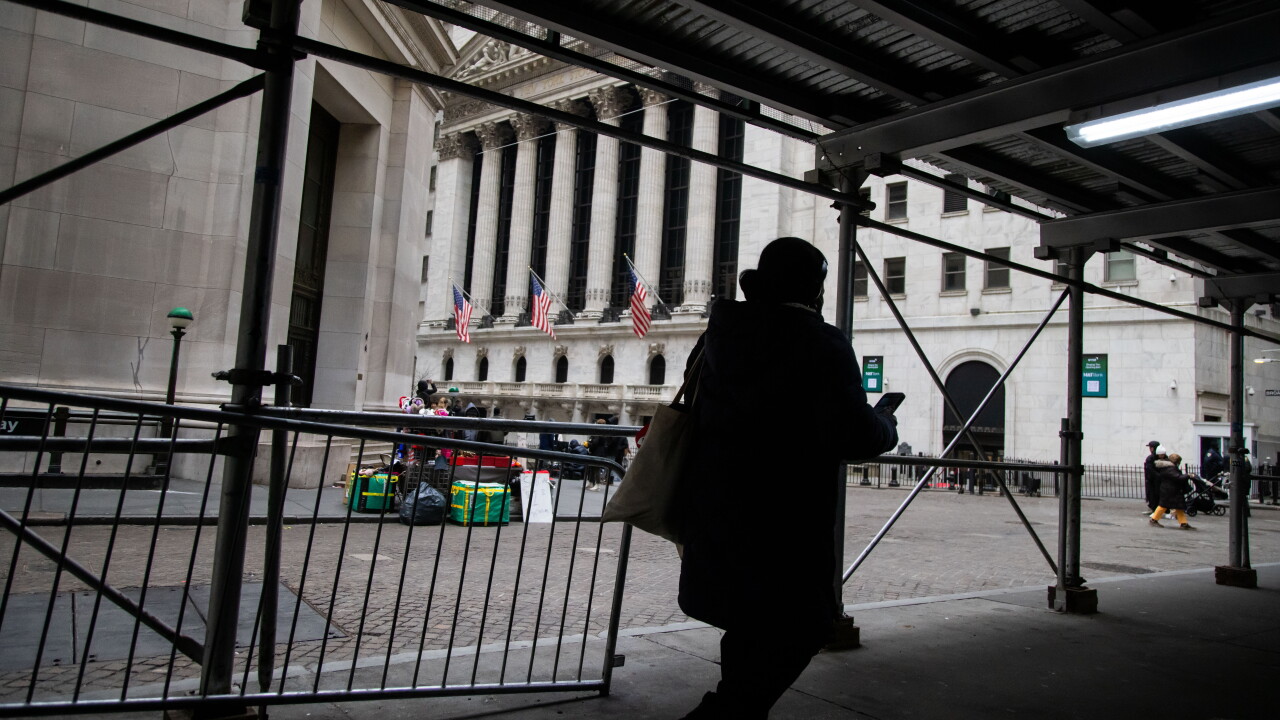 Pedestrians outside of the New York Stock Exchange.