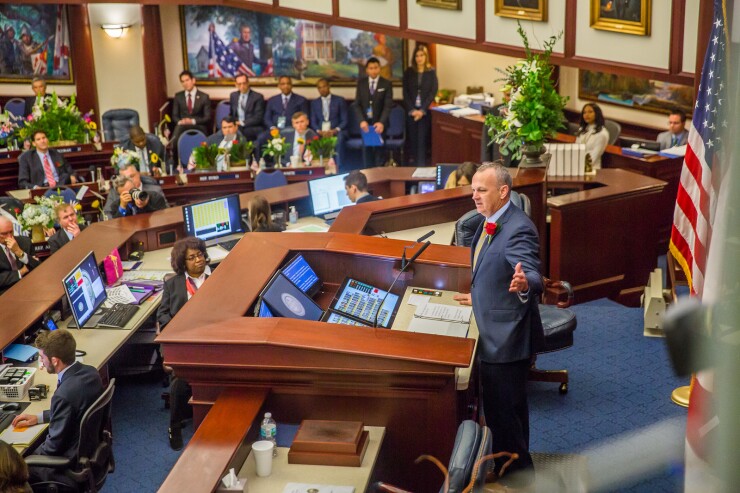 Florida House Speaker Richard Corcoran, at the podium, welcomes lawmakers to the 2018 legislative session.