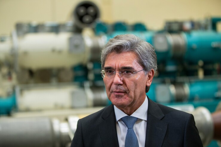 Joe Kaeser, chief executive officer of Siemens AG, on the factory floor at the Siemens switchgear electronic power unit factory in Berlin, Germany, on Thursday, Sept. 13, 2018