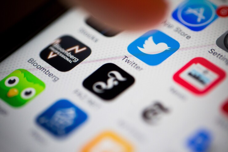 Twitter app on smartphone icon Bloomberg News photo