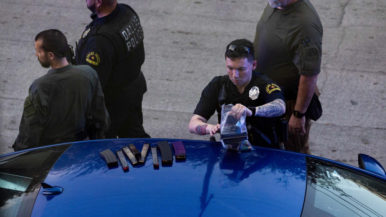 Dallas police officer handles evidence